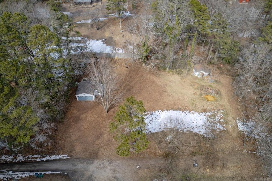 One-acre vacant lot located in South Shore Park Subdivision, offering a former homesite with utilities already in place!  Property includes an exsisting garage, with water and electric on site. Septic system is present; condition unknown.  Seller will have remaining demolition debris removed prior to closing.  Enjoy access to the subdivision's private boat launch area for residents!  Ideal opportunity to build in an established neighborhood with access to Greers Ferry Lake!