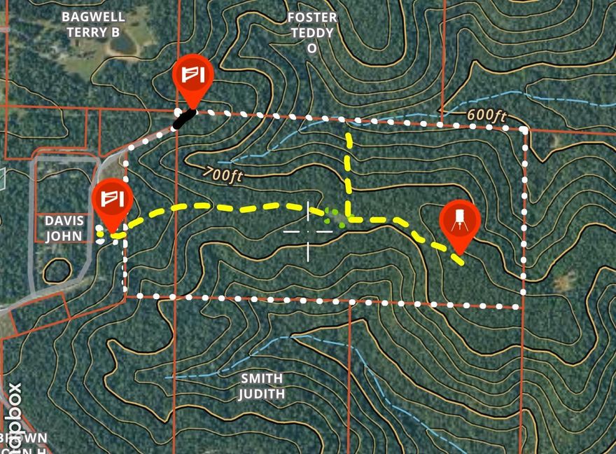 Hunters Dream...  Discover this 90-acre property (more or less), featuring a desirable mix of level building areas and gently rolling terrain ideal for hunting and recreational activities. The topography naturally creates excellent funnels and bedding areas. A well-maintained private road/trail runs east to west through the middle of the property, making access for vehicles, ATVs/UTVs, and setting up hunting lanes effortless. A seasonal creek flows through the northern boundary, providing a crucial, natural water source for the local wildlife population, including deer and turkey. City water access is available at the road. This exceptional property offers the perfect canvas for your dream home, a secluded hunting retreat, or a sprawling family compound. Hunt it, build on it, and make it yours!