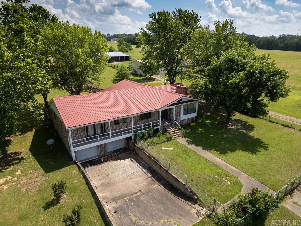 Embrace true farm life on this peaceful 28-acre property with woods and a pond. This 4-bedroom, 2-bath home includes a full basement and a shop with a concrete slab and electricityāideal for fixing equipment, storing tools, etc. Youāll have plenty of room for livestock, a big garden, and direct access to nature.
