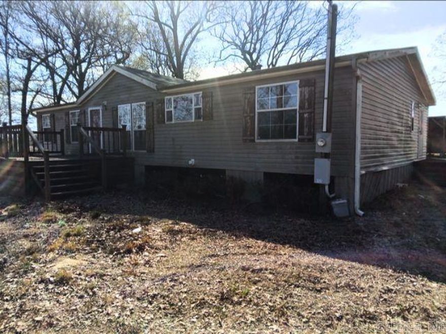 Property is being SOLD AS IS, Where Is! 3 Bedroom/2 Bath manufactured home is clean but needs some work. This is a "Special Situation" please see survey.  Home needs to be moved to another location or back inside the property line.