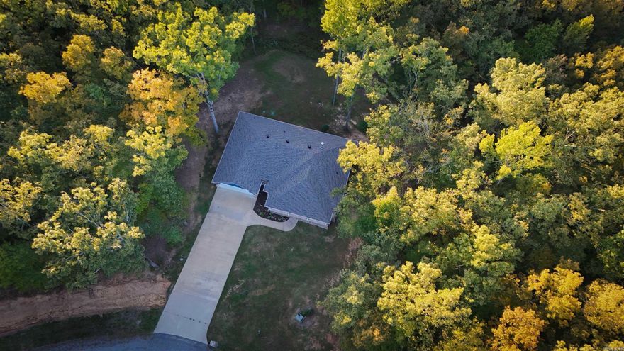 Welcome to this beautifully crafted 3-bedroom, 2-bathroom home built in 2019, perfectly situated on a peaceful 1.09-acre lot. From the moment you arrive, you'll appreciate the wide, inviting entryway that leads into a spacious living area with soaring vaulted ceilings and a cozy wood-burning fireplace—ideal for relaxing evenings.  The heart of the home is a gourmet kitchen featuring granite countertops, under-cabinet lighting, and stylish finishes that extend into both bathrooms. The luxurious primary suite is a true retreat, showcasing tray ceilings with dimmable lighting, double vanities, a walk-in shower, built-in makeup vanity, and a massive walk-in closet.  Enjoy outdoor living on the expansive covered front porch or the private back patio—both complete with charming ceiling fans for comfort all year round.  Recent upgrades (Aug. 2023): New roof, gutters, and gutter guards for added peace of mind.  Conveniently located:      12 minutes to Vilonia      18 minutes to Cabot      20 minutes to Beebe      28 minutes to Conway  Experience the perfect blend of serene country living and easy access to nearby towns. Don’t miss this rare opportunity—schedule your showing today!