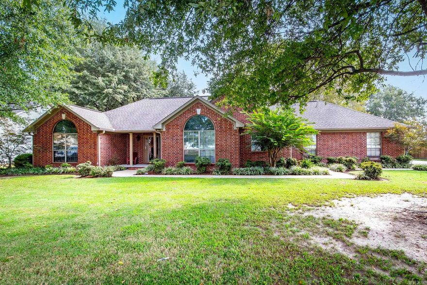 Check out this meticulously maintained split-floor plan home.  It has 3 Bedrooms, 2 1/2 bathrooms, open concept kitchen / living room, large laundry room and tons of storage.  You will love the private covered patio with sink and grill area.  This home also boasts a two-car attached garage and additional outside storage building with electricity, generator included. Schedule your appointment today!