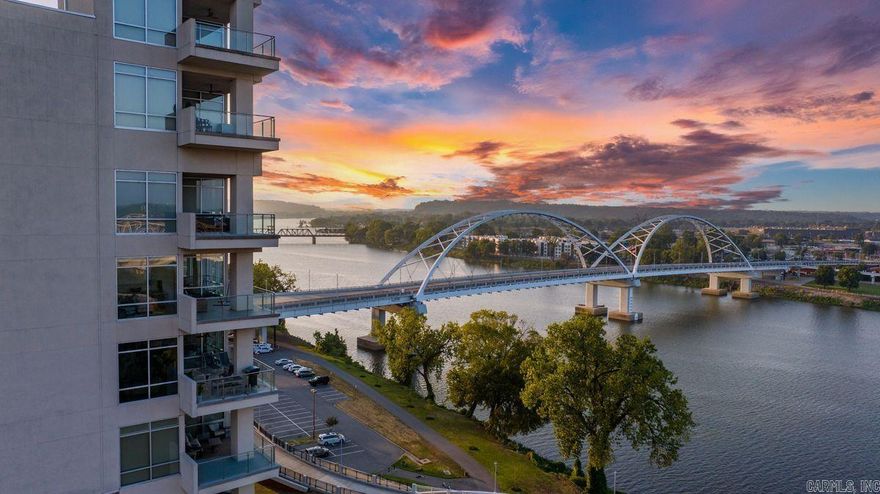 RIVERFRONT luxurious 2 bed/2 bath, 7th floor condo home in the exclusive, intimate & private Statehouse Plaza community. Luxury custom finishes, floor to ceiling windows, state of the art appliances & expansive balcony over the river with a front row seat to Dickey Stephens Ballpark, extensive river activities & fabulous fireworks displays throughout the year providing a turn key living opportunity for a primary residence, second home or investment buyer. Park your vehicles in the covered 3 story parking deck, gated with 24/7 security & walk to every activity available in Little Rock's dynamic downtown.  From the Robinson Theater for musicals & concerts, to Simmons Arena for big concerts, The Rep for off broadway plays, the Clinton Library, the River Market, lots of breweries, the 21 miles Millenial trail for walking & cycling to countless fantastic restaurants, museums, river boating outfitters and more! Fantastic investor opportunity!