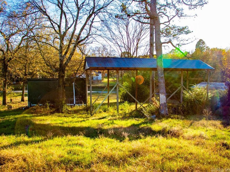 Discover this perfect canvas ready for your dream home. This spacious 2-acres features-  2 electric hook ups with meters, a functioning well, city water is available.  Out side storage buildings convey. Property has a small work shop which provides a great space for your hobby or small projects. Benefit by enjoying the best of both worlds privacy of country living while remaining conveniently located to amenities and local schools. Privacy and accessibility. Make this property your own.  ** mobile home conveys at no value. Schedule a showing today to envision the endless possibilities that await.