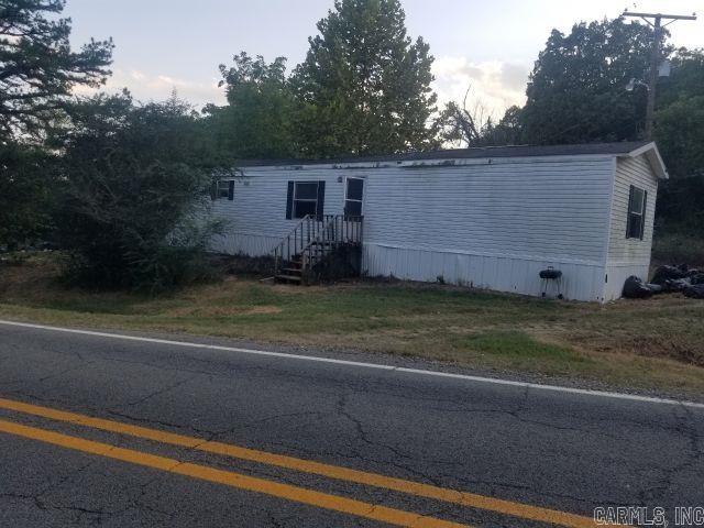 Manufactured home on 1.38 acres in Heber Springs. Property offers multiple income possibilities. Selling AS-IS. Needs some work but has solid potential for investor or owner looking for rental income.