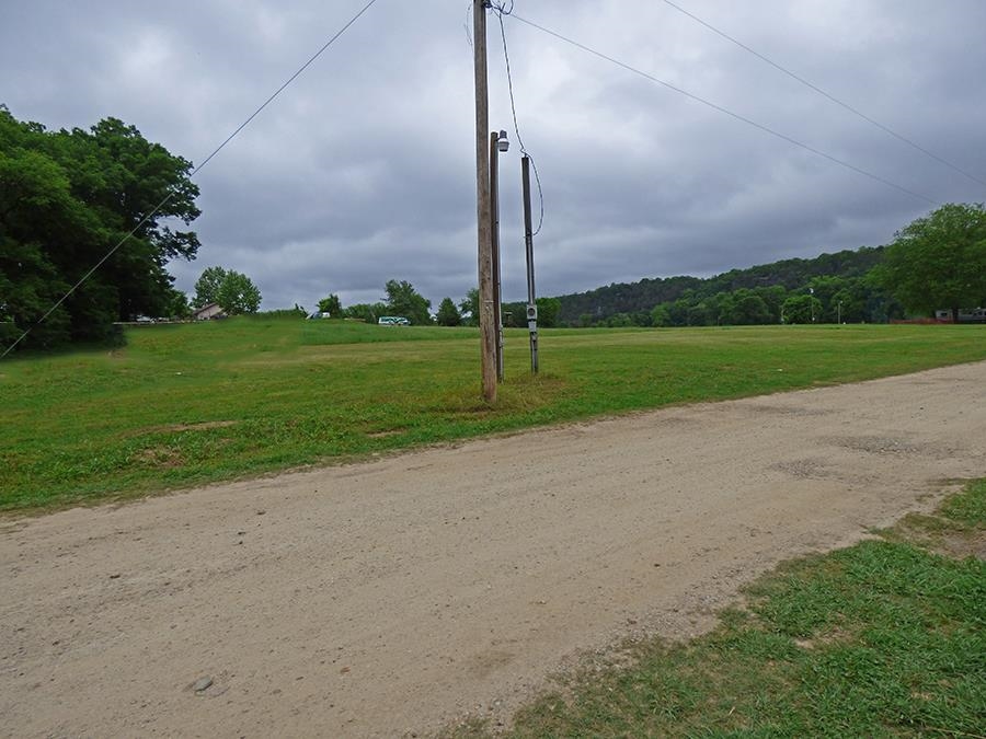 1.05 Acre Tract with a beautiful view of the South Fork River. Water access on property and electric nearby. Plenty of space to park a camper, or build a cabin and have room to relax. No restrictions.