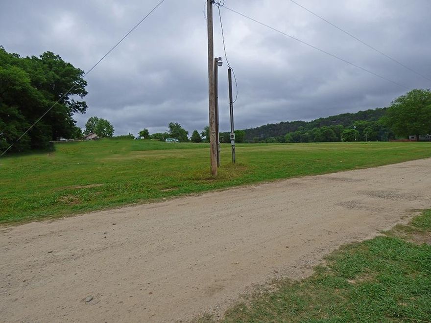 1.05 Acre Tract with a beautiful view of the South Fork River.  Water access on property and electric nearby.  Plenty of space to park a camper, or build a cabin and have room to relax.  No restrictions.