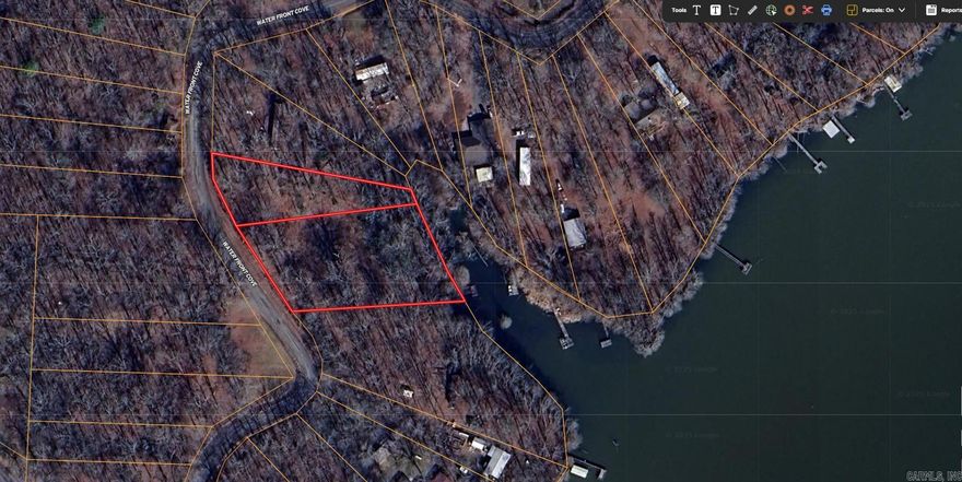 .91 Acre lot on lake conway. Property is in a flood zone so any structures will have to be raised per Faulkner County office of emergency management  Lot has a water meter installed, power is available, and old septic system unknown condition.   Call with questions