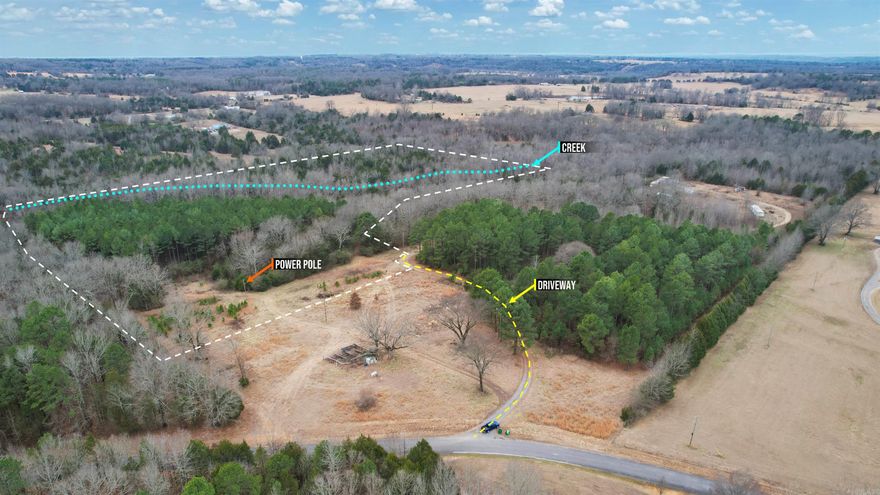 This unrestricted creek property about 10 minutes southwest of Quitman jumpstarts your new home with on-site power and water at the road.  -Creek  -Power Pole On-Site & Water Line at Road -Driveway to Paved Road (Deeded Access) -Ideal Rural Home Setting: Cleared up Front, Wooded w/Creek in Back -Very Buildable: Very Flat, No Floodplain -New Survey   LOT 4: Tucked into the peaceful countryside just outside Quitman, this stunning 21.47-acre property offers the kind of natural beauty and freedom that’s becoming increasingly difficult to find. Enveloping  King Branch creek, this land feels like your own private nature preserve—where the sound of flowing water, abundant wildlife, and towering trees create a setting that’s both relaxing and inspiring. The property is thoughtfully balanced for country living, with a cleared area near the front that’s perfectly suited for a homesite, while the wooded back portion gives way to the creek corridor, providing shade, privacy, and an incredible wildlife habitat drawn by the water and healthy forest cover.
