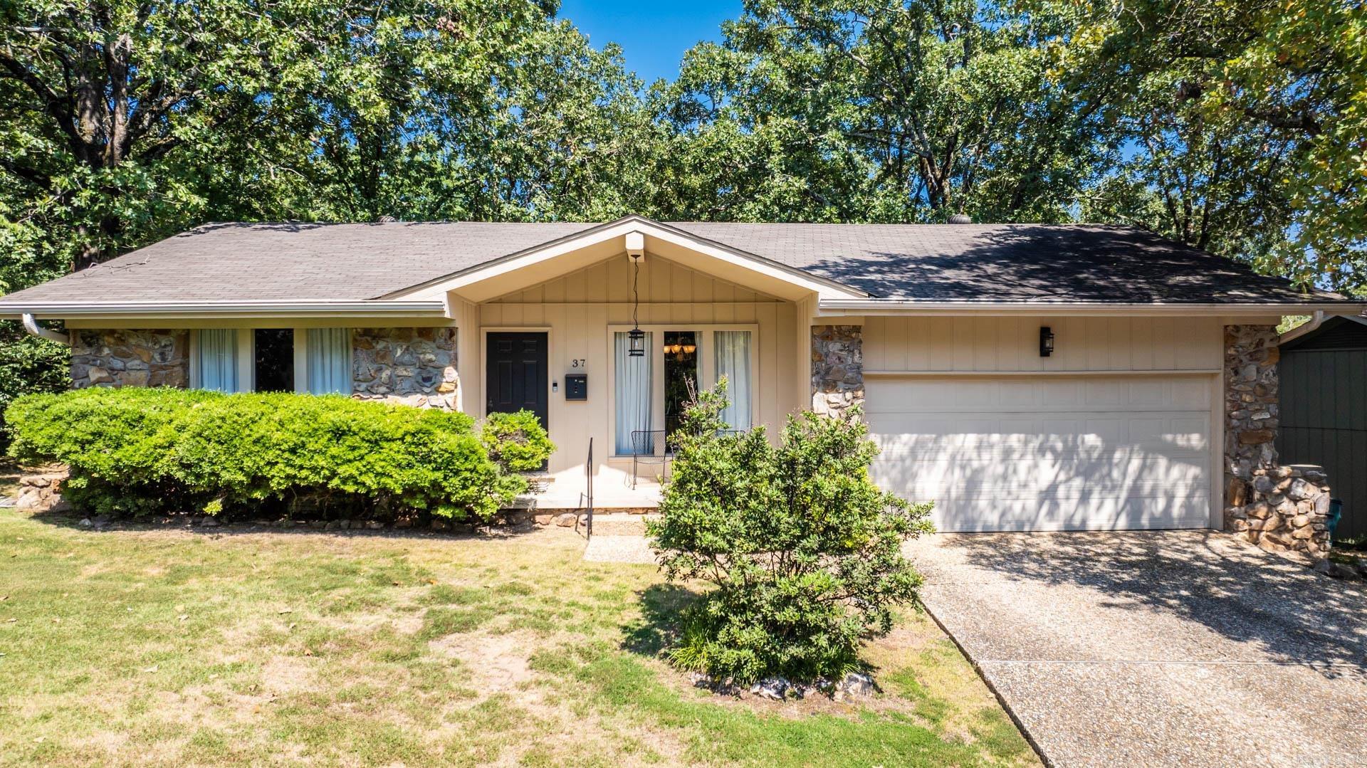 This wonderful home is in a fantastic, convenient location! It features two spacious living areas: a formal living room and a cozy family room complete with a fireplace. The formal dining area is currently utilized as an office, adding flexibility to the layout. The kitchen has stainless appliances and offers a lovely view of the fenced backyard. You'll love the recently updated master bathroom, which features a new tile shower and stylish flooring. Step outside to enjoy the inviting deck—perfect for relaxation or entertaining! Plus, there’s a large laundry room with a sink for added convenience!