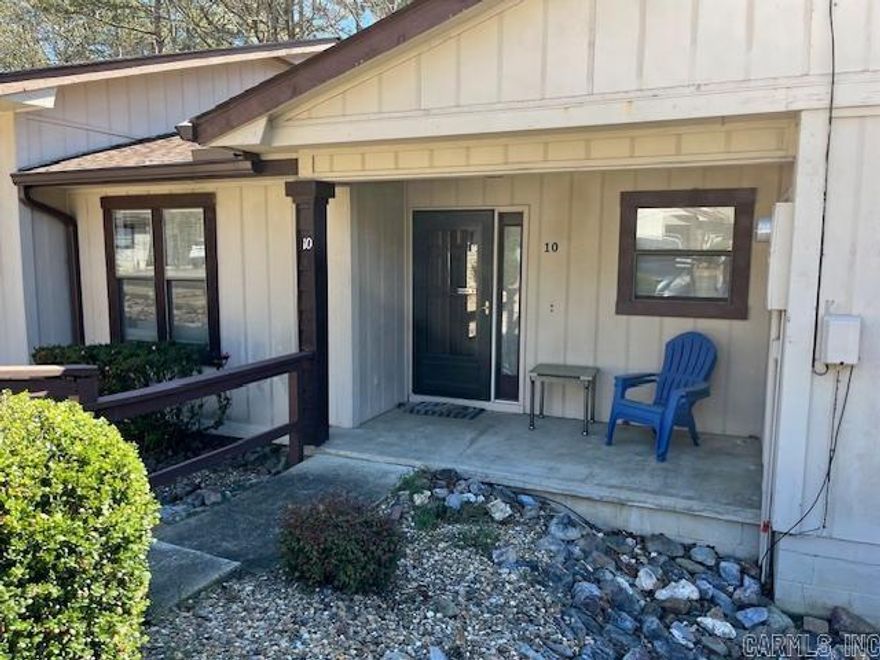 Beautiful move-in ready townhome just needing your own personal touches.   This 2 bdrm, 1.5 bath unit is conveniently located near the West Gate and many amenities. It is just off the beaten path, quiet and peaceful and nature loving.  There is an extra refrigerator on the deck for drinks and such, so spending time outside is easy to do. Great as a full time live in, or a weekend get away, please take the time to check it out. You won't be disappointed! Washer and Dryer do not convey.  Property being sold "as is".   Agents see agent remarks.....