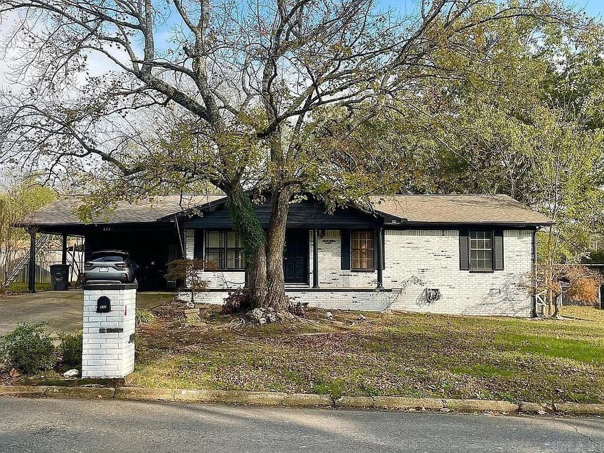 This charming 3-bedroom, 2-bathroom home at 832 Bellaire Dr offers 1,456 sq. ft. of living space on a spacious 0.32-acre lot.  The property features several attractive updates, including new floors, butcher block countertops, and a farmhouse sink. A new roof was installed in August 2021, providing peace of mind for potential buyers.  The fenced level yard boasts mature trees, creating an ideal outdoor space for families and pets to enjoy. One of the home's key selling points is its convenient location near Lakeside Schools. The property is also close to North Park Medical Center (NPMC), offering easy access to medical care.  Hot Springs, where this home is located, provides residents with a variety of amenities, including shopping, dining, and outdoor recreation opportunities.
