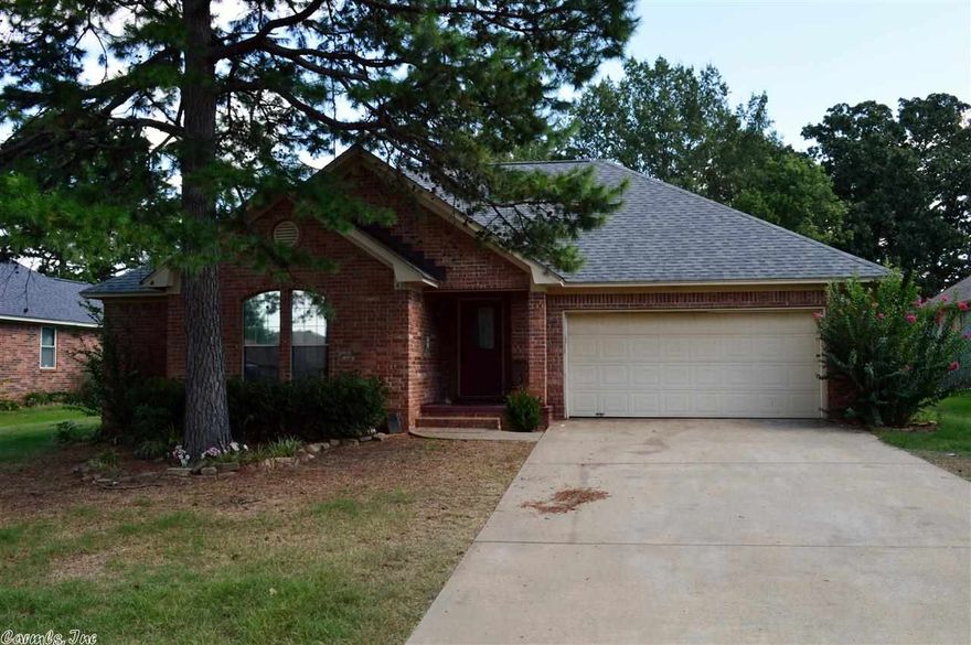 Great home with staind concrete floors. Open kitchen to the great room. Large backyard with a garden area. Your kids can even walk to school.