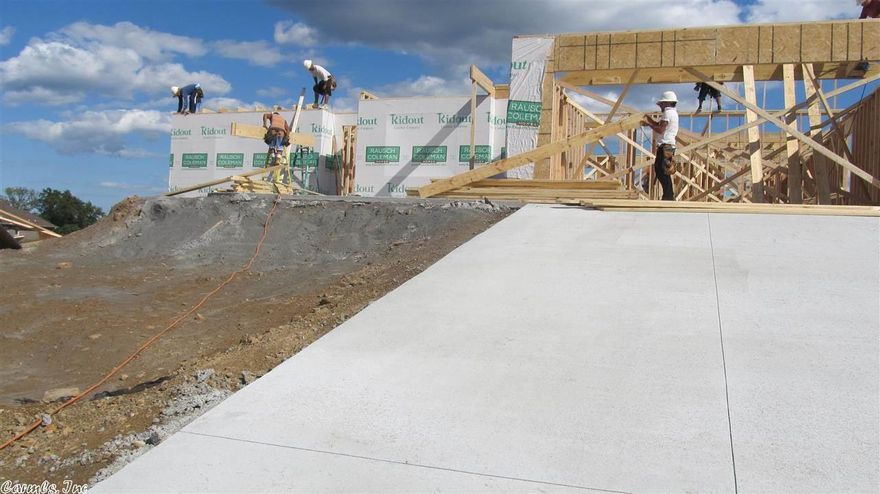 4 Sides Brick; architetural shingle; covered patio ; jetted tub; upgraded hardware; recessed lighting; stainless steel appliances; granite; ceremic tile in wet areas; handscrapped hardwood; 1/2 glass front door; full glass rear door w/blinds;