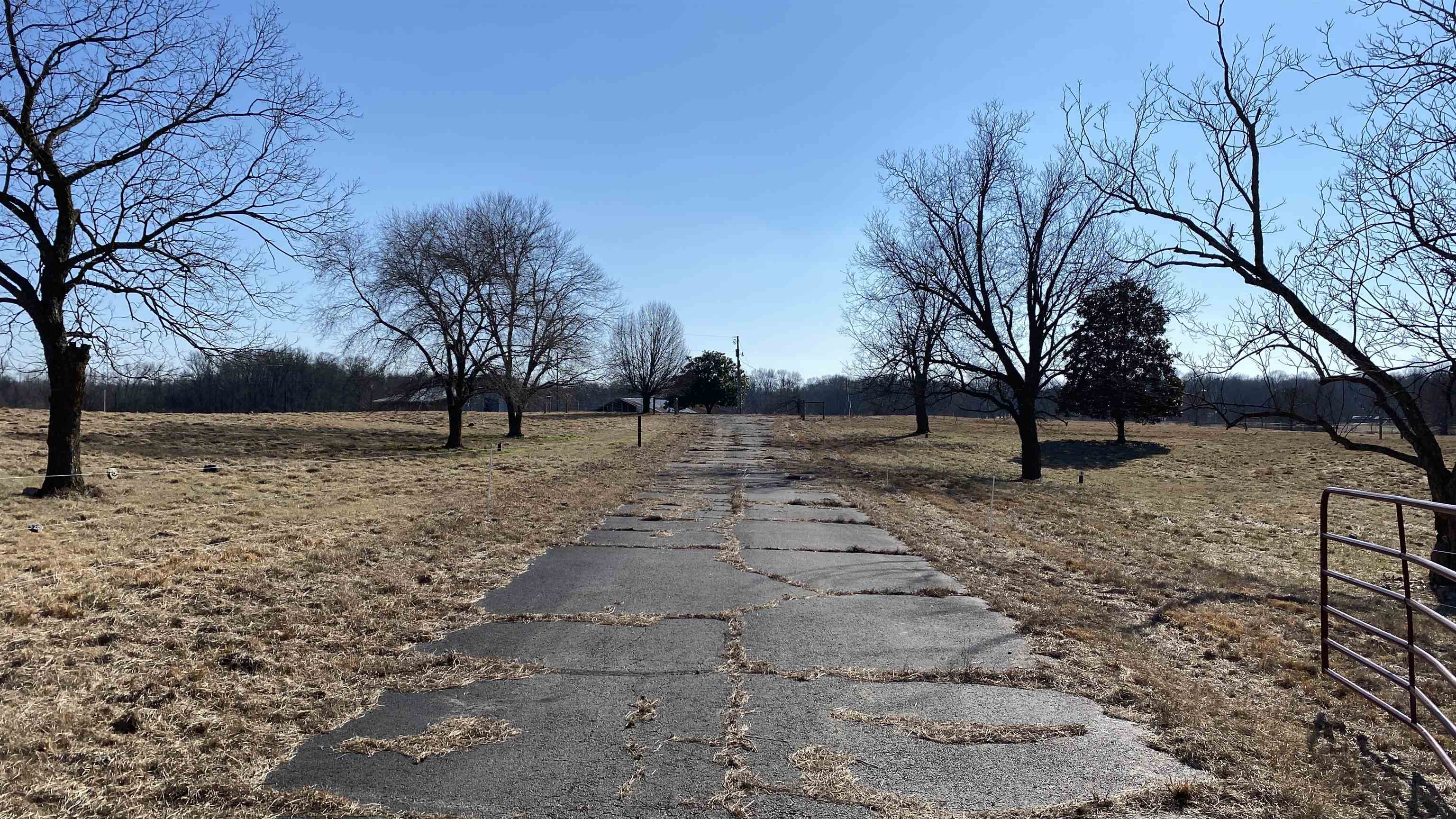 The Homeplace Farm is a legacy property on the banks of the Little Red River in Searcy, AR. This tract is fenced, cross fenced and irrigated. Several barns and buildings populate the property allowing for shelter and storage of equipment, livestock and hay. The Cypress lined ponds have docks over the water for recreational enjoyment and one of the ponds can be filled from the river. Along with being easy on the eyes, the mature Pecan trees that dot the fields also provide shade for livestock.