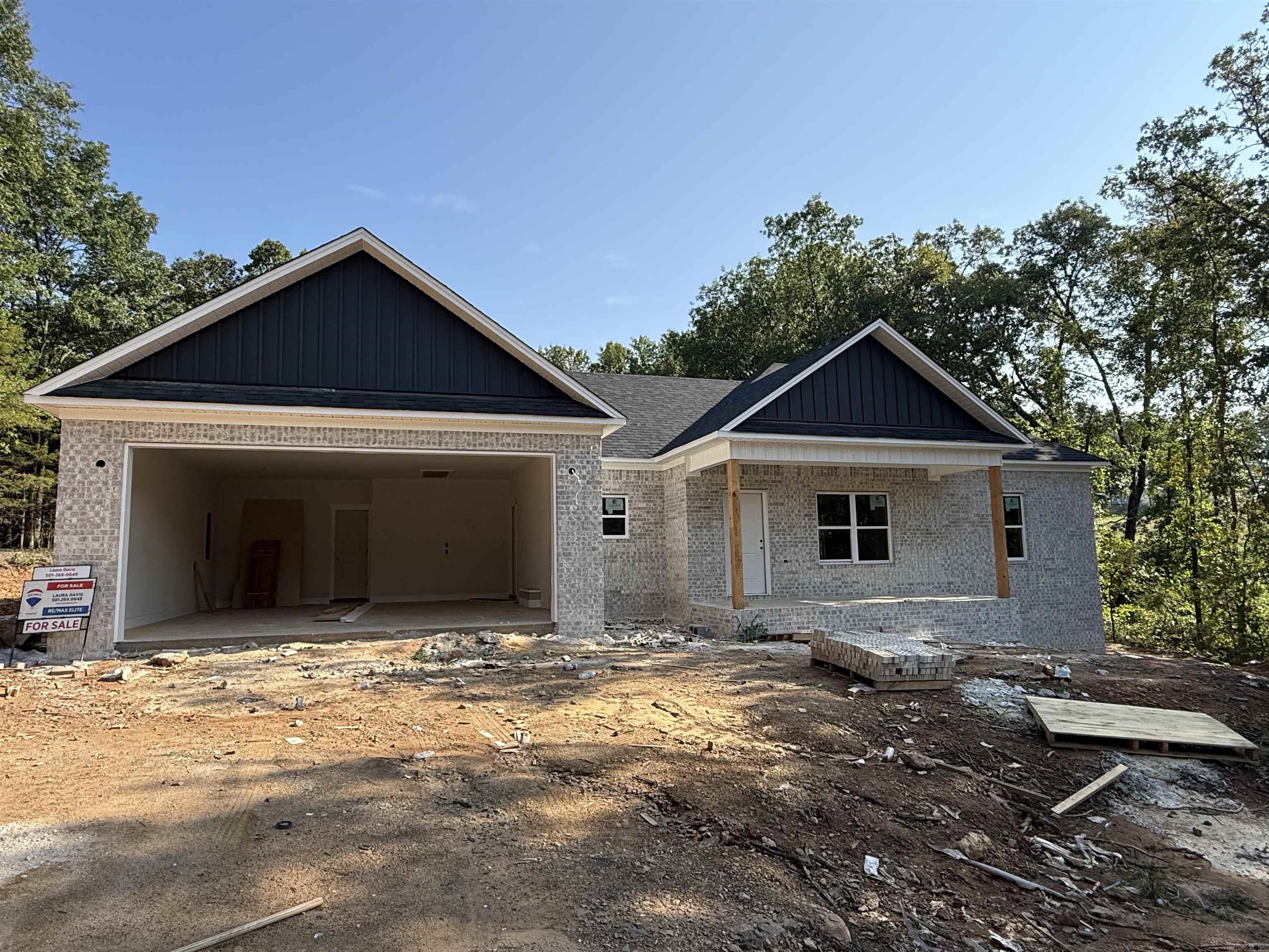 New construction home on 1 acre lot with woods. Private backyard. Luxury vinyl throughout. Lots of cabinets in the kitchen with an amazing pantry hidden behind cabinet doors. Vaulted ceiling in the living room with an electric fireplace. Very nice laundry room with extra cabinetry. Lockers as you come in from the garage. This house lives large with all of the extras. Quiet dead end street convenient to Hwy 65 in the Greenbrier school district.