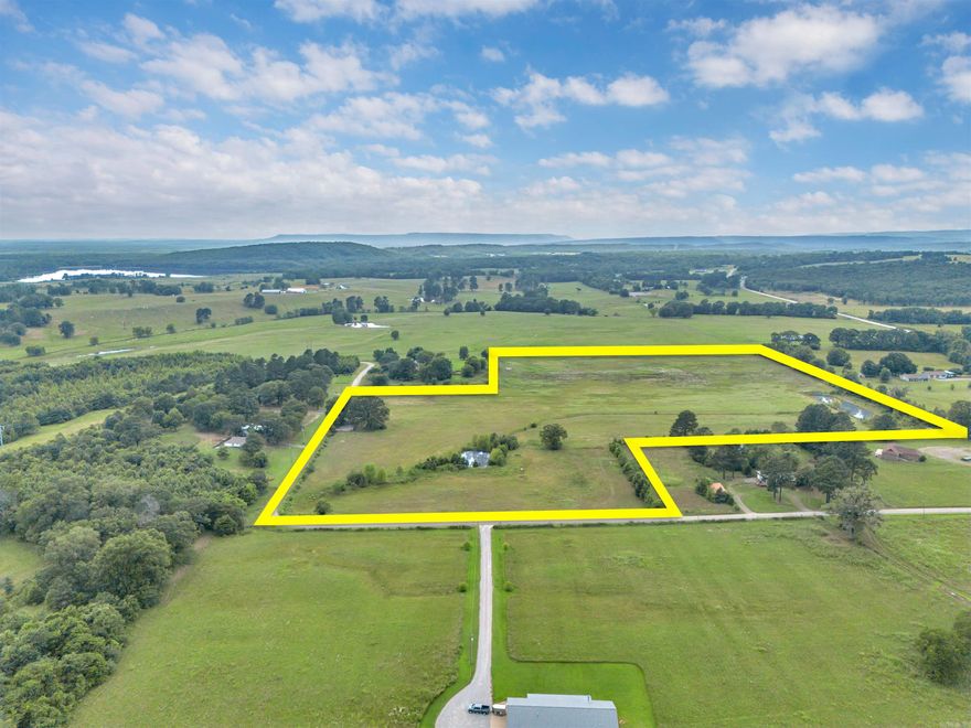 29.96+/- acres in the Hattieville area!  Close to Lake Cargile.  Mostly pasture with a few trees and a small pond. Partially fenced. Mineral rights do not convey.