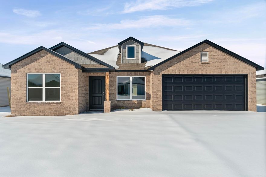 Discover the captivating Carnegie II plan, distinguished by its inviting covered entryway and beautifully landscaped front yard that exudes curb appeal. This thoughtfully designed home encompasses 4 bedrooms and 2 bathrooms, providing ample space for comfort and privacy. The spacious living room offers a welcoming environment for relaxation and gatherings. The kitchen is a chef's delight, equipped with energy-efficient appliances, abundant counterspace, and a convenient pantry for storage. The adjacent laundry room, situated just off the garage, ensures practicality for families of any size. The master suite includes a luxurious walk-in closet, enhancing the home's appeal and functionality. Explore more about this remarkable home today!    **SEE SHOWING REMARKS & AGENT REMARKS FOR IMPORTANT INFORMATION**