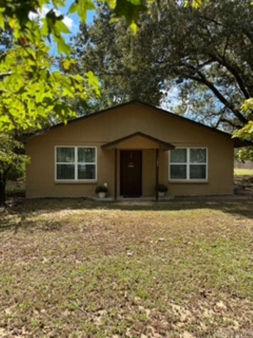 Come grab your slice of the country living pie! This home is adorable! Block exterior offers low utility bills. One level. Nice easy floor plan. Newer flooring, paint, and kitchen counter tops. Two acres offers plenty of privacy. The land is partially fenced for animals. Barn located towards the back of the property. Very centrally located to Hot Springs, Malvern, Magnet Cove, Benton, and Little Rock.