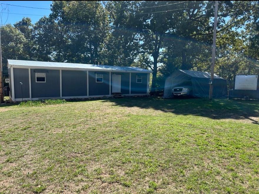 Tucked away on 3 peaceful acres at 1170 Many Islands Rd, Mammoth Spring, AR, this recently updated 1-bedroom, 1-bath manufactured home with a bonus room offers the perfect blend of country charm and modern comfort. Inside and out, the home has been refreshed, creating a warm and inviting space ideal for full-time living, a weekend retreat, or an investment rental.  A spacious storage shed provides plenty of room for tools, outdoor gear, or hobbies, while the acreage offers privacy, open space for gardening, and room to enjoy the quiet beauty of the Ozarks.  Located just minutes from the Spring River, known for its excellent fishing, canoeing, and kayaking, and close to Mammoth Spring State Park, home to Arkansas’ largest natural spring and the historic dam, this property captures the best of small-town charm and outdoor adventure.  If you’re searching for a peaceful getaway or a nature lover’s haven, this property is a must-see. Note: No title to the manufactured home.