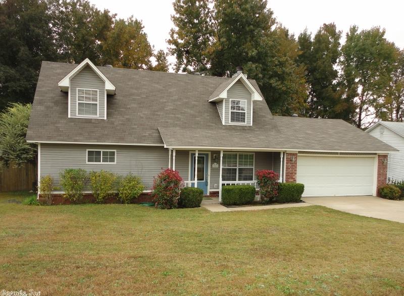 This charmer has been updated, new carpet, floors, counter tops, custom back splash, fixtures, exterior doors, roof & paint throughout. Quiet neighborhood w/easy highway access. Open floor plan has a fireplace w/gas starter. A large master suite features a private bath w/2 walk in closets & double vanity. Upstairs is another bath & 2 large bedrooms & lots of storage. Patio is in large fenced back yard. 100% financing available.
