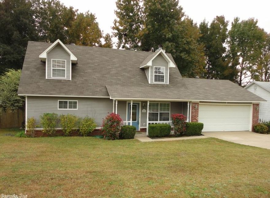 This charmer has been updated, new carpet,  floors, counter tops, custom back splash,  fixtures, exterior doors,  roof & paint throughout. Quiet neighborhood w/easy highway access.  Open floor plan has a fireplace w/gas starter.  A large master suite features a private bath w/2 walk in closets & double vanity.  Upstairs is another bath & 2 large bedrooms & lots of storage. Patio is in large fenced back yard. 100% financing available.