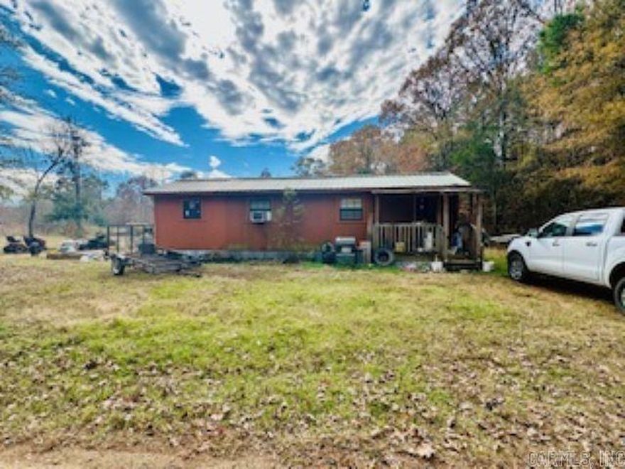 This charming property offers both comfort and convenience in a picturesque setting. This 3BR/2BA sits on 5 acres with a beautiful creek that runs right through the middle of the property. This home has been beautifully built by the current owners and just needs a little bit of your finishing touch to make it home! There is a large living room, 3 large bedrooms, master has walk in closet, and the home just has that country cabin feel to it. There is a 18x20 detached garage on the property as well. This property is approx 8 miles from Amity, approx 6.5 miles to Lake Degray Amity Landing, 7 miles to Cox Creek Landing, and 6.6 miles to Amity access to the Caddo River.