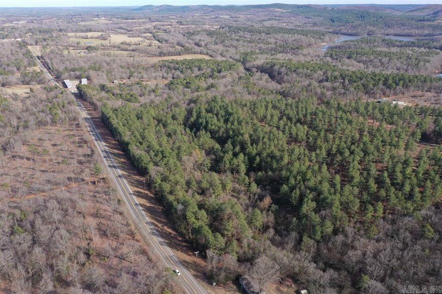 13.02± acres located off Highway 70 near Kirby, AR, outside city limits. This property offers road frontage and  potential for various uses. Situated near Lake Greeson, the land provides access to local natural attractions and outdoor recreation opportunities. Whether for development or long-term investment, this tract presents a versatile land ownership opportunity in a well-traveled area. Owner is the listing agent.