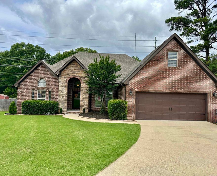 Stunning Brick & Stone Home in Sought-After Valley View School district with 5 Bedrooms and 3 Full Baths.  Welcome to this fantastic brick and stone residence nestled in the desirable Valley View area. This elegant home features a formal dining room highlighted by stately brick columns and beautiful hardwood floors. The spacious family room boasts a cozy fireplace and soaring ceilings, perfect for relaxing or entertaining.  The eat-in kitchen is a chef’s dream, complete with granite countertops, a breakfast bar, and a built-in oven. The luxurious primary suite offers a peaceful retreat with a private sitting area and an en-suite bathroom featuring a soaking tub, separate shower, and a large walk-in closet.  Three additional bedrooms and a full bathroom are conveniently located on the main level. Upstairs, you'll find a large bonus room or 5th bedroom with its own closet and full bath—ideal for a guest suite, media room, or home office.  Additional amenities include a two-car garage, a privacy-fenced backyard with classic brick posts, and a covered patio that opens to a deck—perfect for outdoor entertaining.