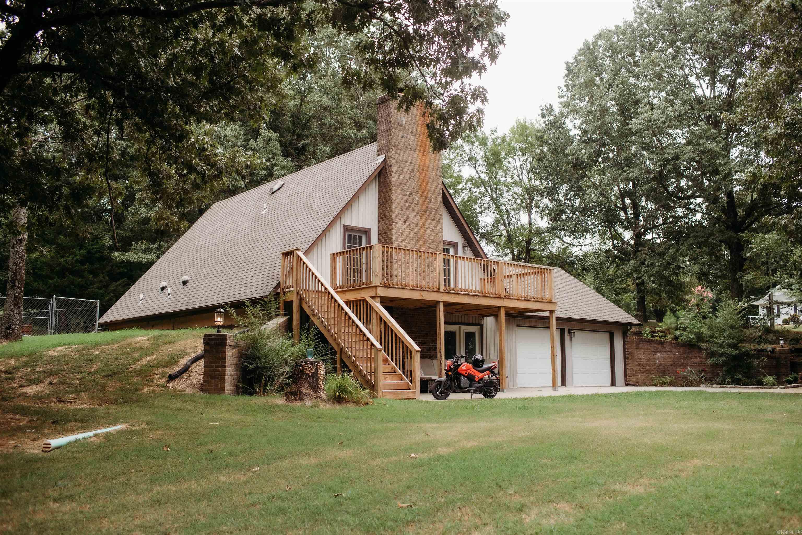 Enjoy the serenity of the countryside while staying connected with this beautifully maintained 3-bedroom, 2 bath home nestled on approximately 2 acres off a paved blacktop road. This charming home features brand new wood flooring installed by Burns Flooring in 2024, a cozy layout, and all kitchen appliances stay for your convenience. Step outside to your newly built deck, perfect for relaxing as you take in the view of the private pond and surrounding trees. The fenced backyard provides a safe space for pets or children, and you'll appreciate the two storage buildings for all your tools and toys. Whether you're looking to escape the hustle or enjoy space to roam, this property offers the best of country living with modern comfort.