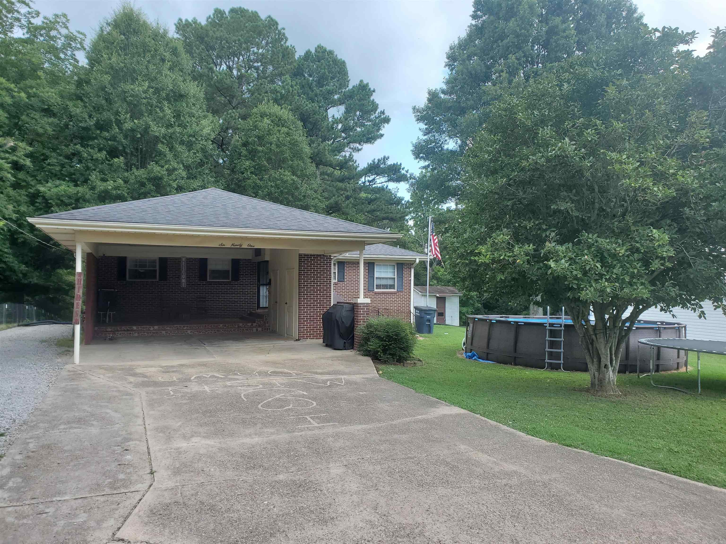 If you are looking for a 4BR, 2BA, move-in ready home then this property is a must see! 691 Crestline Dr. Piggott, AR. is a 2,770-SQFT, brick home nestled at the end of the street. The home sets on a 75'x323' (0.55-acre) lot. There is 2BR, and 1BA on the main living level and 2BR, and 1BA in the finished basement. The main level offers a spacious family room perfect for big family gatherings. The basement has a family room. storage room, office space and a large laundry room. A relaxing 12'x25' sunroom makes for the perfect spot to kick back and unwind. A very nice 20'x28' finished out shop with A/C and Heat sits at the back of the property for the perfect mancave shop!