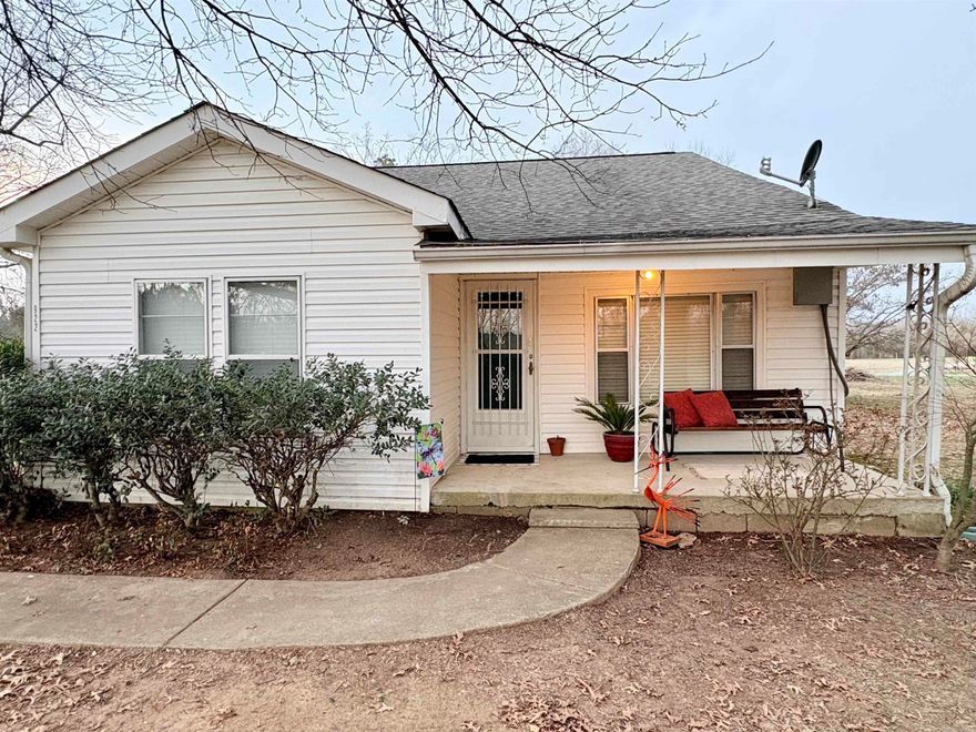 Welcome to 922 Highway 258 in Bald Knob — the perfect starter home or ideal spot for a small family ready to enjoy peaceful country living! This charming 2-bedroom, 2-bath home offers a spacious layout with a large kitchen and dining area, perfect for gathering with family and friends. Move-in ready and full of potential, several major appliances convey with the sale, including the range, refrigerator, washer, and dryer — making your transition that much easier. Inside, you’ll find a blend of character and comfort, with original hardwood flooring in half of the home, central heat and air, and a generously sized laundry room that leads into an enclosed covered back porch. Situated on 1.93 acres, the property provides plenty of room to spread out. The separate shop with an automatic roll-up door is ideal for storage, hobbies, or projects. There’s even enough space to add a garden, additional outbuilding, or create the outdoor setup you’ve always wanted. Conveniently located near Bald Knob Lake access, you’ll enjoy both privacy and accessibility. MOTIVATED SELLER — come see it for yourself and imagine the possibilities waiting for you!