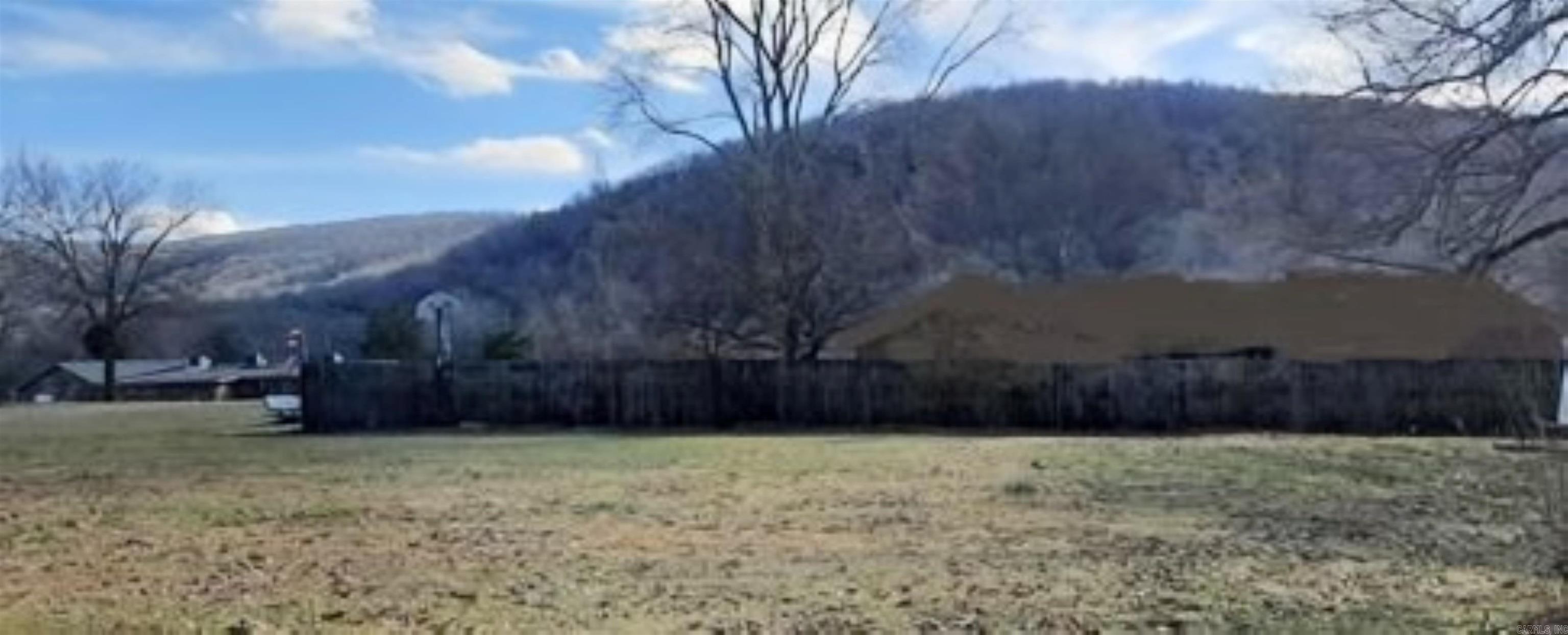 Very nice level lot in the city limits. Build your dream house here and look out over the mountains.