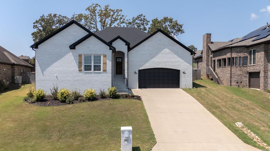 This like-new one-story home in Creekside has all the space and comfort you’re looking for. The white brick with wood and black accents gives it a modern, welcoming look. Inside, the open floor plan connects the living room, kitchen, and dining area. Big windows let in tons of natural light, and the living room has a cozy fireplace with built-in shelving. The kitchen features gorgeous counters, a wood-wrapped island, and a HUGE walk-in pantry. The dining space leads right out to a covered patio and fenced backyard — great for relaxing or entertaining. You’ll find 3.5 bathrooms, including a Jack-and-Jill setup, so no one has to share. The primary suite has double sinks, a black spa tub, walk-in shower, and large closet. Across the home are three oversized bedrooms that work well for either family members, guests, or a home office. There’s plenty of storage throughout plus an oversized garage for extra space. Enjoy the convenience of Creekside — near all the essentials and just a short drive to Little Rock Air Force Base.