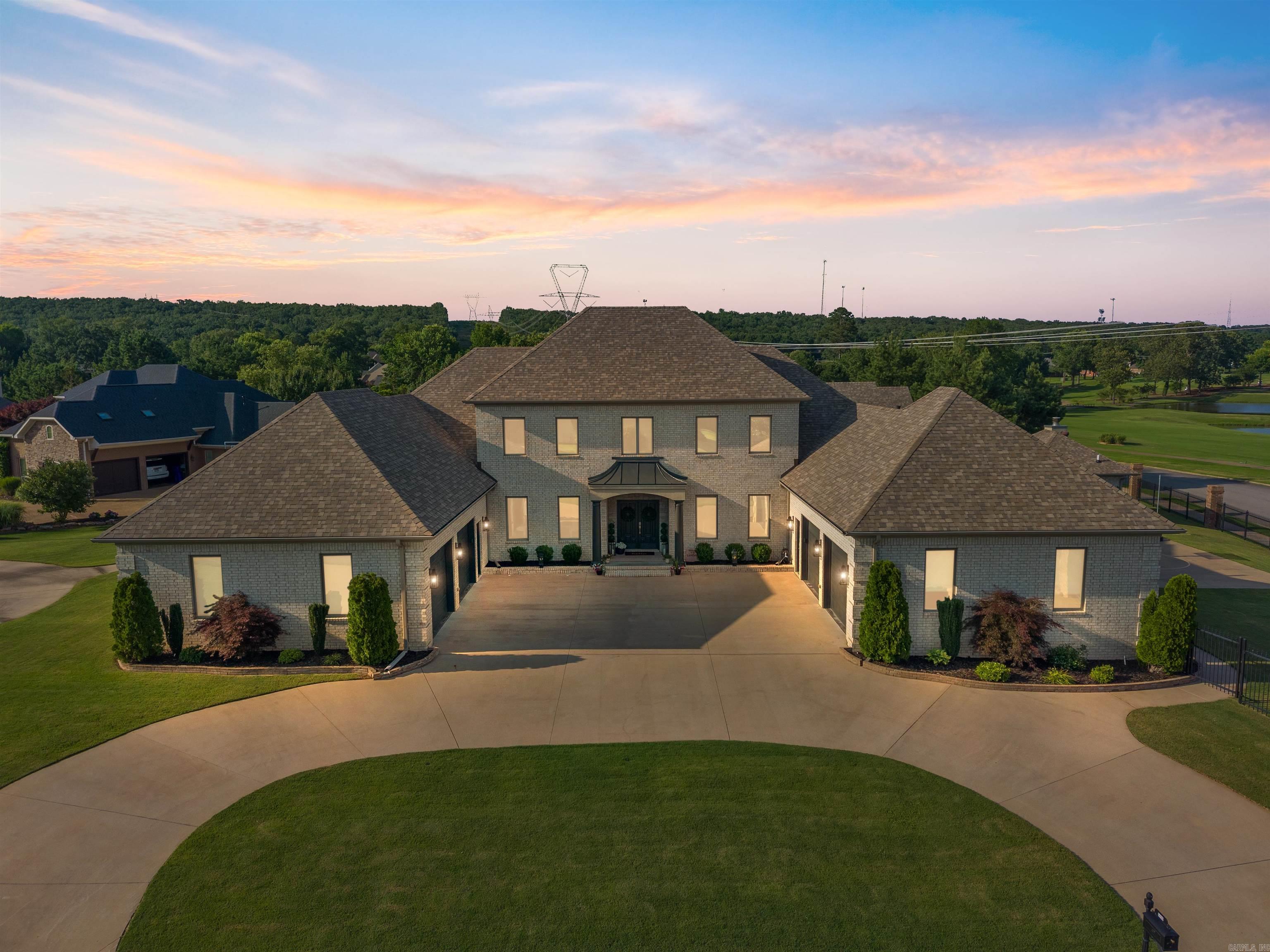 Welcome to a true masterpiece, a truly iconic house that radiates modern style, sophistication, and comfort. Located at the entrance of the prestigious Fairways at Centennial Valley, this estate offers 5,661 sqft in the main residence and an additional 2,012 sqft in the fully furnished guest house steps away from the pool. This estate is more than just a home- it’s an experience. The grand circular driveway leads to one of the expanded dual garage entrances, totaling at a massive 1753sqft of parking and storage space, including a heated and cooled area. Inside, the residence features updates throughout, with new paint, custom trim/ blinds, and high-end appliances/ finishes/ and fixtures. A spacious mother-in-law suite with its own private entrance and circle drive offers privacy and convenience. Step outside to your personal oasis: a heated saltwater pool, cabana, private basketball court, and easy access to the guest house with its own bar and entertainment space. Whether relaxing or entertaining, this estate offers an unmatched lifestyle of luxury and comfort. This home boasts an endless array of features and updates- it's truly a must-see that will leave a lasting impression.