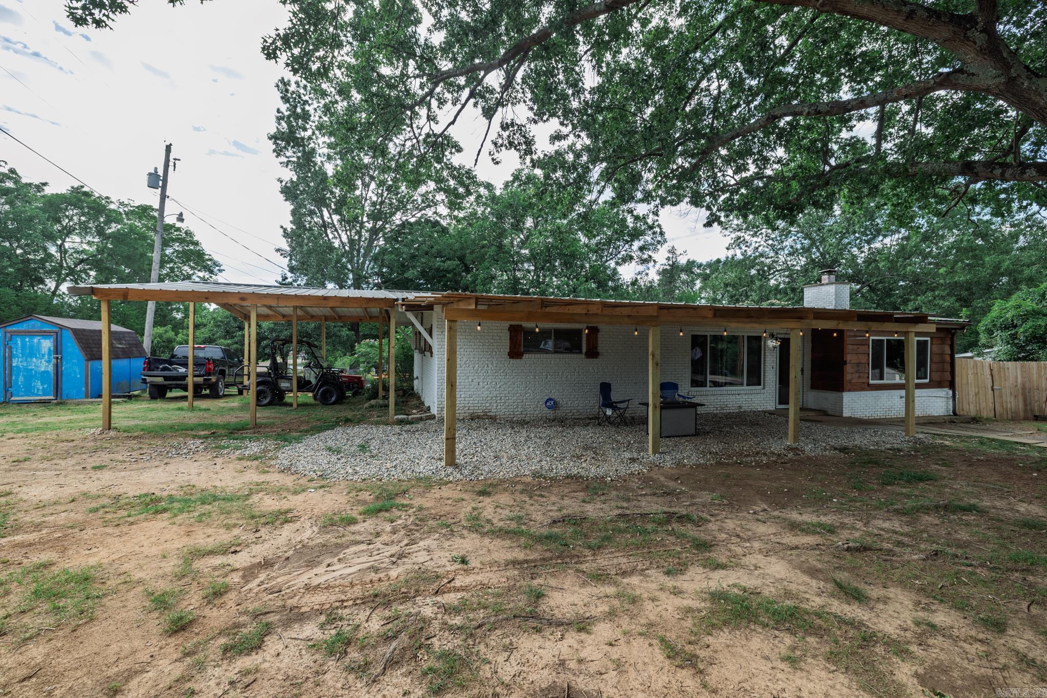 This beautifully updated three-bedroom, two-bath home is located just outside of Hot Springs in the highly desirable Lake Hamilton area—only a minute from the lake. Offering the perfect blend of comfort and convenience, the home features numerous updates throughout, including a new carport, fresh flooring, and modern finishes that give it a refreshed and inviting feel. The spacious layout is ideal for both relaxing and entertaining, while the fenced-in backyard provides a private outdoor space perfect for pets, children, or weekend gatherings. Whether you're looking for a primary residence, vacation home, or investment property, this charming home offers incredible potential in a prime location near one of Arkansas's most sought-after lakes.