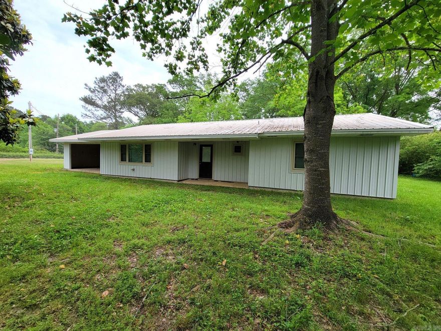 Country living at it's best and totally remodeled! This 3 bedroom, 2 bath home has 2160 square feet, open living, kitchen and dining combo. Kitchen features huge island, granite countertop, solid oak cabinets, and stainless steel appliances. Blinds throughout and windows are the best available from Windows USA tilt to clean and energy efficient. Property offers 2 car garage, 6 acres for complete privacy and has well and septic. Beautiful large Magnolia and Tulip trees in the front yard.