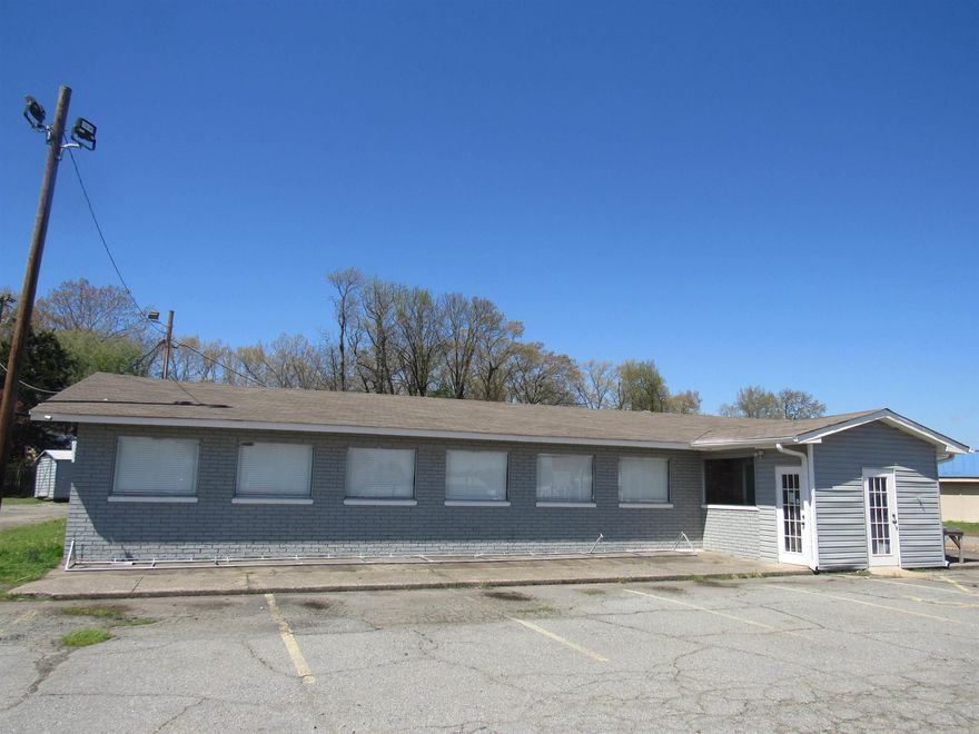 Large Restaurant, has had updates with new flooring, new lights, etc. 2 sections to this building, can be used as 2 rentals or as 1 big business. This is the old Aps Seafood Restaurant with a large lot and plenty of parking. Down road from Walmart One way traffic. Lots of potential for rental income or a large restaurant or retail business, medical, lots of opportunity for a business with high traffic. Plenty of parking all around building. Hwy dept has been working on roads but almost completed. Must see this large restaurant with everything you need to start your dream business OR would make a great rental. Has the 3 compartment sink, a mop sink, walk in cooler and storage rooms, and a large vent-a-hood and has his and hers bathrooms plus a bathroom in the back with a shower. Lots of storage in this restaurant. Make your appointment today!!!