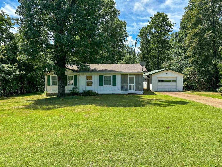 Quaint and cozy, this affordable 2 bedroom, 1 bathroom home with detached garage and screened porch is nestled in the trees on a nice and level lot.  All appliances are included and with a little TLC this could be just the little getaway or place for retirement that you have been looking for!  This house has been priced for an "AS IS" and "WITH ALL FAULTS" sale!   Call to see it today!