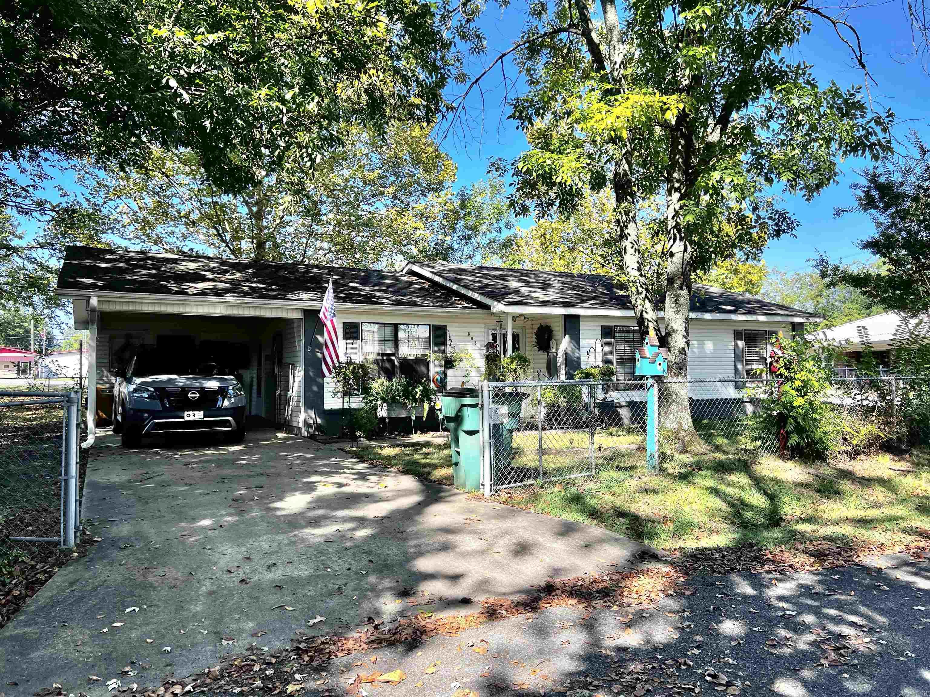 This little doll house is a rare find! Nestled under some nice shade trees and located right across from the school this 3 bdrm 1.5 bath home would welcome a new family with warmth and comfort. All hard surface flooring, nice size living/dining combo with a nice sized kitchen with a pantry. Yard is completely fenced in around the house to keep those little fury friends in and out. This little house is not far from the Little Red boat dock so you could enjoy some afternoon fishing! Roof replaced 2016, New HVAC 2024 flooring throughout the house replaced 2023.