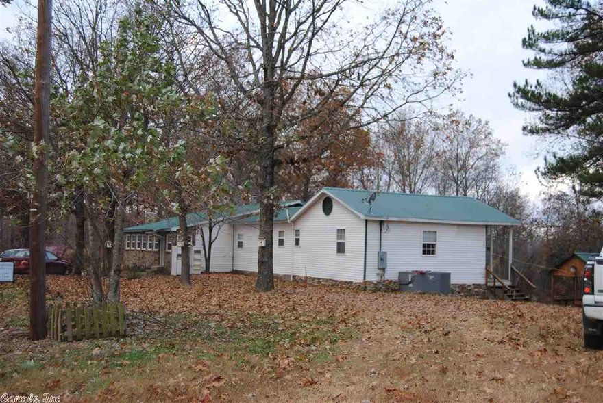 4 BEDROOM, 3 BATH HOME ON 12 ACRES, HARDWOOD FLOORS, LOG SIDING AND SHEET ROCK WALLS, AWESOME VIEWS OF THE MOUNTAINS, PASTURE AND BARNS, TIMBER LAND, NEAR BUFFALO RIVER PARKLAND, VERY SPACIOUS HOME, OUTBUILDING, HAS PICNIC AREA, TWO AREAS TO HAVE A FIREPLACE OR WOOD STOVE, GREAT HUNTING AREA, BIG FAMILY ROOM OR SUNROOM, ON A DEAD END ROAD, PRICED TO SELL