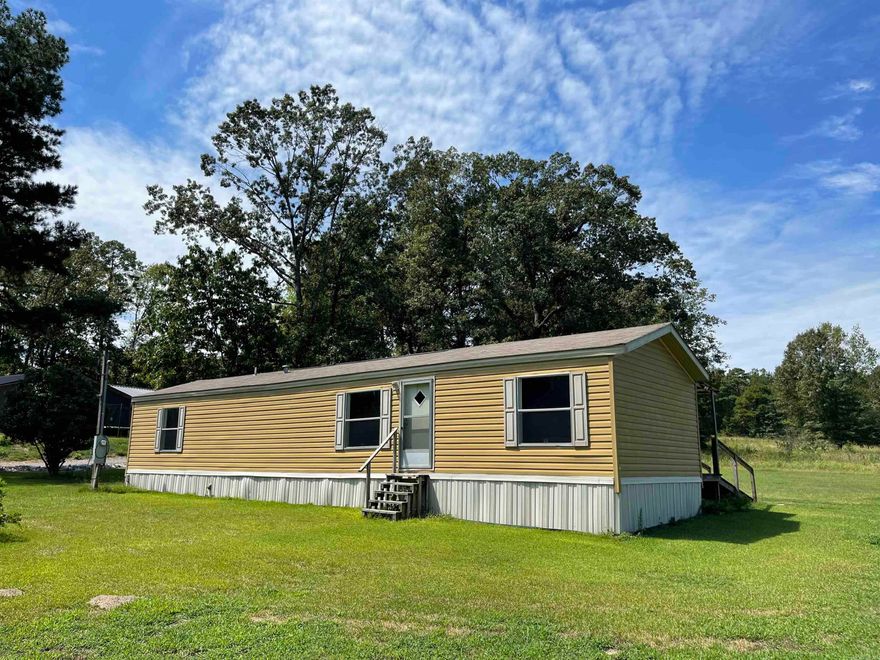 Discover peaceful country living on this 9.3 acre property! This well-kept 2 bedroom, 2 bathroom home offers comfort and charm surrounded by nature. Enjoy the quiet setting with plenty of room for gardening, hobbies, or simply relaxing in your own private retreat. With open land and beautiful scenery, this property is perfect for those seeking space, serenity, and country living at its best.