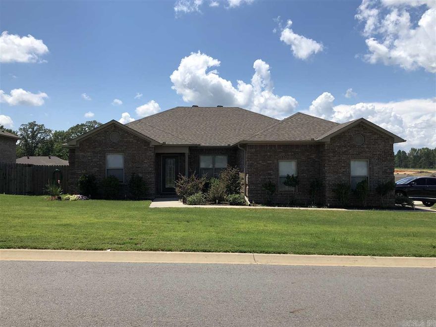 Gorgeous 4 bed/2 bath,custom features throughout,crown molding,tumbled stone back splash,kitchen pantry,under cabinet lighting,ceramic floors in all wet areas,GE stainless steal appliances throughout,Master offers luxurious bathroom,double marble vanity,large walk in closet w/builtin shelving,vaulted ceiling,custom colors,landscaped/mulched,gutters,home includes ceiling fans in all rooms! NO SMOKING. Pets allowed with owner approval and payment of $250 non refundable pet fee per pet.