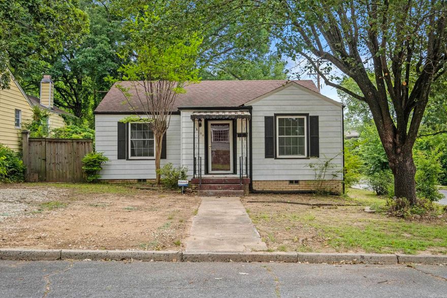 Bungalow in Park Hill, this 2-bedroom, 1-bath home presents an exceptional opportunity for first-time homebuyers and investors alike. The home features two generously sized bedrooms, original hardwood floors, crown molding, and an abundance of natural light throughout. The functional kitchen offers white cabinetry and a tile backsplash, while a dedicated laundry room adds everyday convenience. Outside, a spacious fenced backyard provides privacy and room to grow, complemented by a detached outbuilding ideal for a workshop or additional storage. Mature shade trees and classic curb appeal complete this package. With solid bones, fresh interior paint, this property offers outstanding value with significant upside potential. Whether you're entering the market for the first time or expanding your investment portfolio, this is an opportunity not to be missed. Schedule your private showing today!