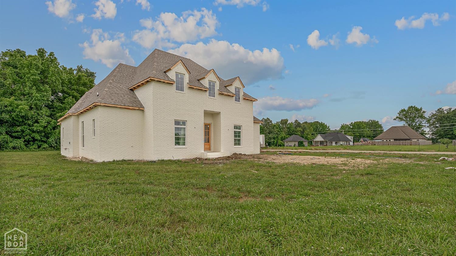 Welcome to this stunning new construction home offering luxury, space, and modern style on 1.52 acres! With 4 beds, 3 bathrooms, and nearly 3,000 square feet of open concept living, this beautifully designed home has everything you're looking for. From the moment you arrive, the crisp white painted brick exterior and 3-car garage make a striking first impression. Inside, you'll find a large, light-filled layout perfect for everyday living and entertaining. The heart of the homes is the spacious eat-in kitchen, complete with a breakfast bar, ample counter space, and a seamless flow into the living area anchored by a gorgeous gas log fireplace. Step outside to enjoy the covered patio, ideal for relaxing evenings or hosting guests. With high-end finishes, thoughtful design, and plenty of room to spread out, this home is the perfect mix of comfort and elegance all on a beautiful piece of land. Don't miss your chance to make this dream home yours!