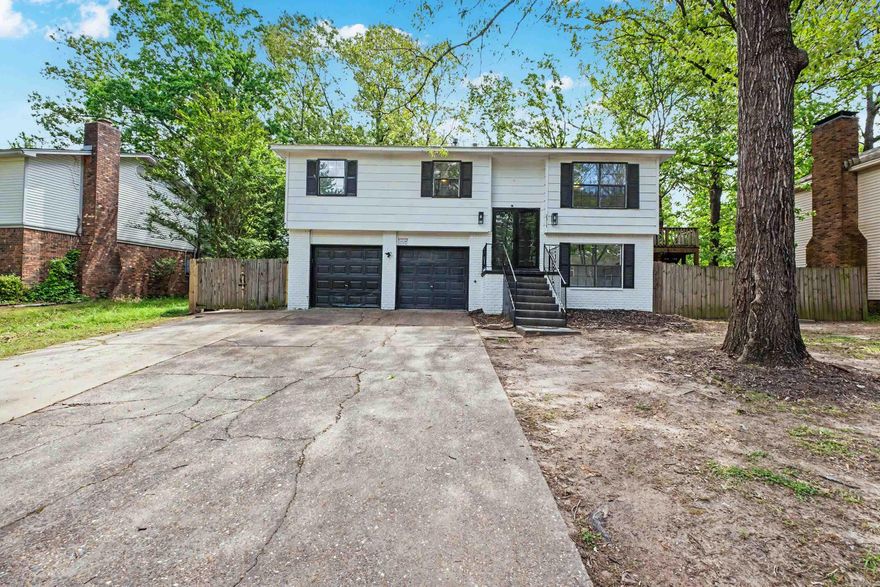 Lots of space in this home. Tons of options and exceptional versatility Upstairs you'll find 3 bedrooms and 2 baths along with the living room, dining and kitchen.  Downstairs is a generous family room and a game room complete with a wet bar creating the perfect setting for gatherings.  The lower level also provides ample space for a 4th bedroom, home office and fitness room.  Tailor it to meet your lifestyle needs.  A full bath and additional half bath add convenience and functionality.  With a large, fenced yard and abundant square footage, this property delivers outstanding value and endless potential for customization.  Fresh paint and updates.  Refrigerator conveys.