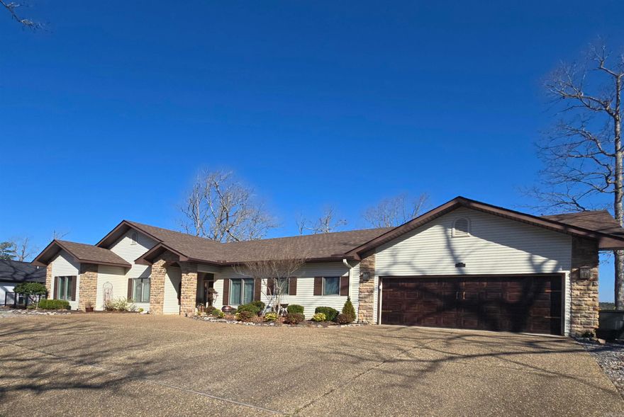 Breathtaking Lakefront Living on Lake Sophia VIEW, VIEW, VIEW! From the moment you step through the front door of this immaculate 3-bedroom, 2.5-bathroom home, you are greeted by a fabulous, panoramic vista of Lake Sophia. Designed to frame the natural beauty of Hot Springs Village, this home perfectly blends elegance with a comfortable lakeside lifestyle. The heart of the home features a stunning open-concept kitchen complete with sleek marble countertops with a spacious layout. Whether you’re hosting a holiday dinner or a casual weekend brunch, the flow between the kitchen and the living areas creates a lovely environment for entertaining the entire family against a backdrop of sparkling water. Wake up to serenity every morning in the Primary Bedroom, which boasts its own fantastic, unobstructed view of the lake. It’s a private sanctuary designed for relaxation. Wrought Iron Fencing secures the property all the way down to the flagstone walkway on the  seawall.   A storage building on the side of the house stays with the property—perfect for lake gear or gardening tools. More pictures coming soon!