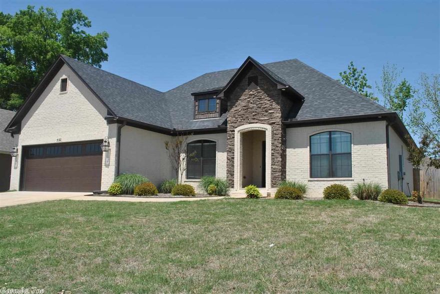 Pack your bags! This is the ONE! This fabulous custom-built home has open living/kitchen areas with a split floor plan. Dark wood floors lay in living areas, bathrooms are stained concrete and carpet in bedrooms. Granite countertops, high ceilings and crown moldings add an exceptional touch. This is a perfect home for entertaining guests or spending time with family. Large fenced backyard, security system, swingset and outdoor tv are all part of this remarkable home in the desirable Chapel Creek.