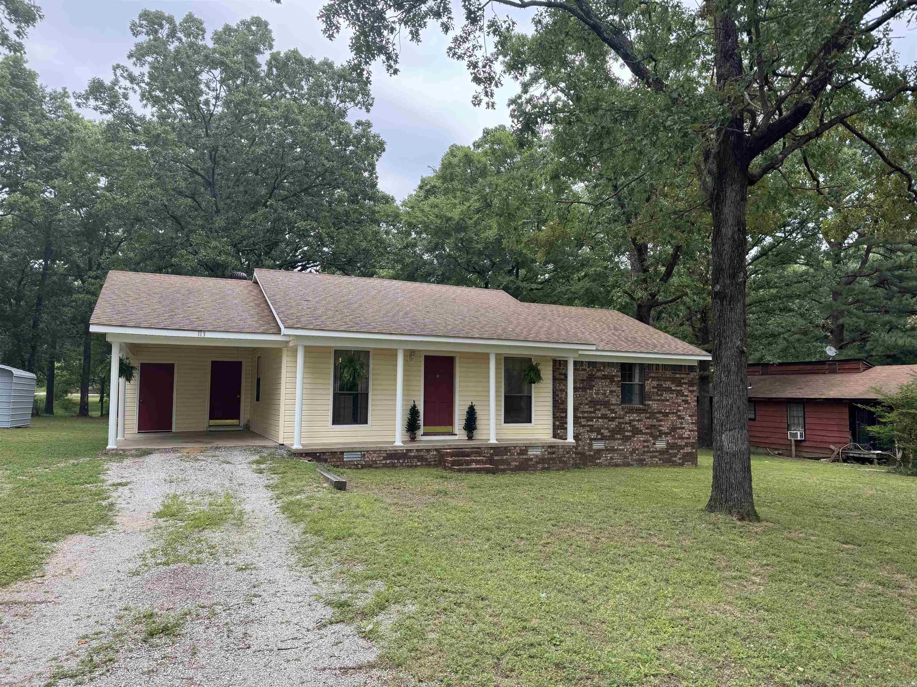 Very well maintained 3 bedroom/2 bath brick and vinyl home in Southside school district. Seller is offering $5,000 FLOORING ALLOWANCE for new flooring of your choice. Lovely, mostly-level lot with wonderful backyard and lots of shady trees, storage building included. Furnishings may be purchased with home