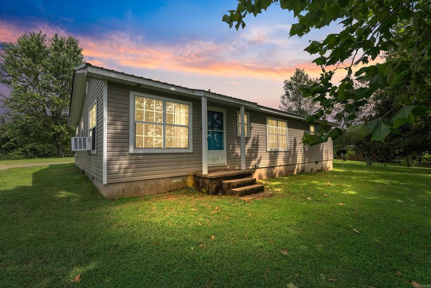 Amazing opportunity to own a home in the Greenbrier School District on one acre at a great price!  Hardwood floors in the living room, bedrooms, and hallway.  Tons of character in this home, it just needs some cosmetic updates. Large primary suite with updated paint and flooring, and an attached ensuite bathroom. The kitchen features a stove, oven, pantry, and refrigerator that conveys. The spacious laundry room also has a sink and washer/dryer hookup.  The exterior of the home features vinyl siding, and the windows of the home have been updated as well.  Metal roof, which typically lasts longer and is more sturdy than shingles. Enjoy the tranquility of living in the country on one acre. Plenty of space between neighbors. Great location with easy access to Greenbrier, Guy, and Greers Ferry Lake. Schedule your private showing today!